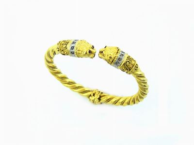 Bracciale Rigido in Oro Giallo e Bianco con Diamanti
