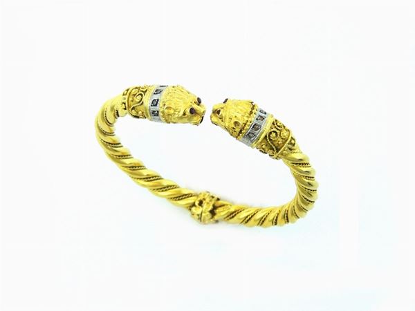 Yellow and white gold bangle with diamonds