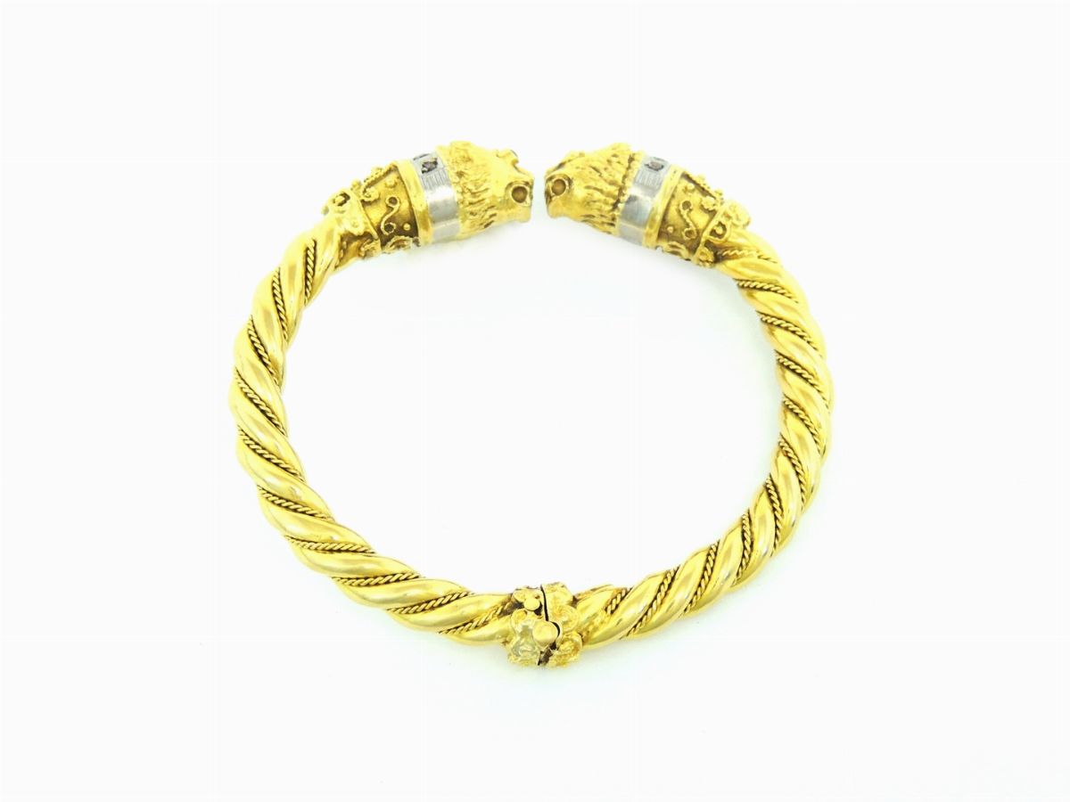 Bracciale Rigido in Oro Giallo e Bianco con Diamanti