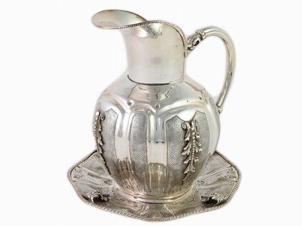 A Silver Pitcher with Plate