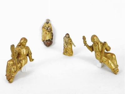 Quattro Sculture in Legno Intagliato e Dorato