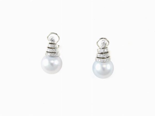 White gold ear pendants with diamonds and grey colour cultured South Sea pearls