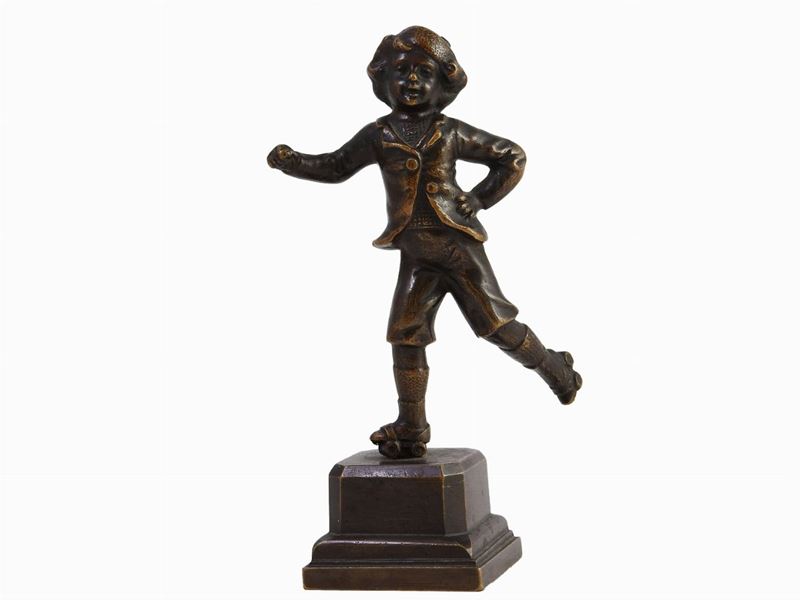 Bambino con Pattini a Rotelle