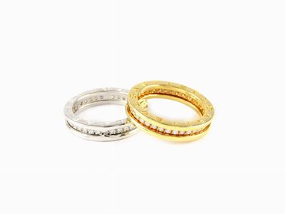 Coppia di Anelli a Fascia Bulgari in Oro Giallo e Bianco con Diamanti