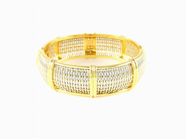 Yellow gold and steel bangle with diamonds