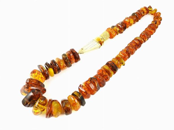 Yellow gold graduated necklace with amber and ivory
