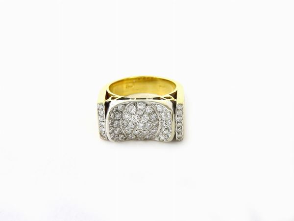 White and yellow gold ring with diamonds