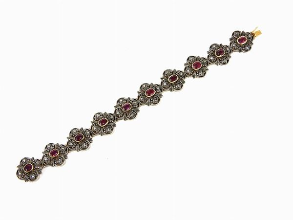 Yellow gold and silver bracelet set with diamonds and rubies