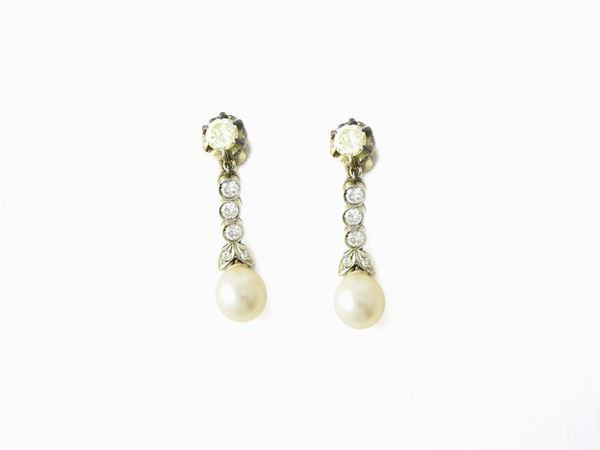 Yellow gold and silver ear pendants with diamonds and pearls
