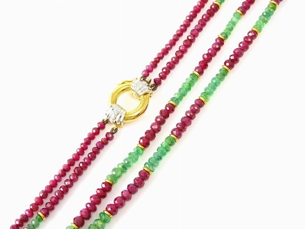 Two rubies and emeralds graduated strands necklace, white and yellow gold clasp with diamonds