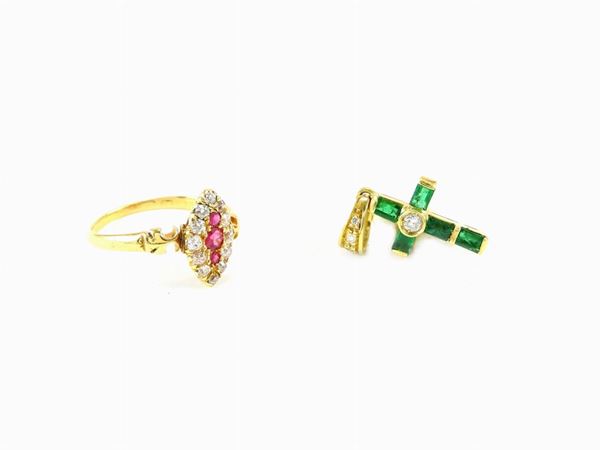 Yellow gold ring wth diamonds and rubies, and yellow gold cross with diamonds and emeralds