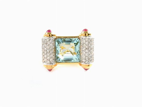 Yellow gold ring with diamonds, rubies and aquamarine