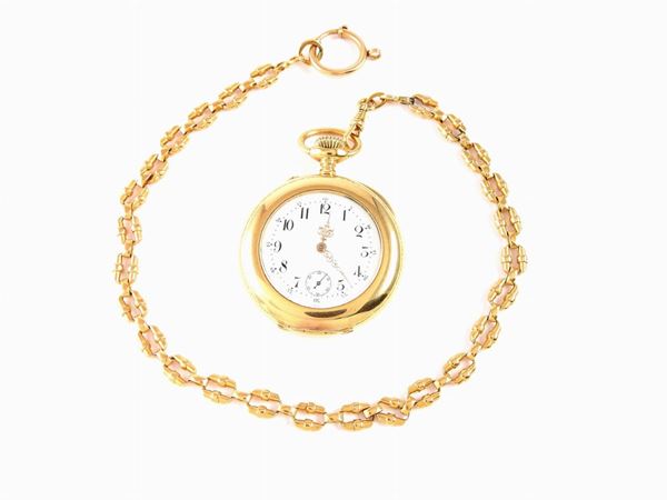 A. Humbert yellow gold pocket watch with chain