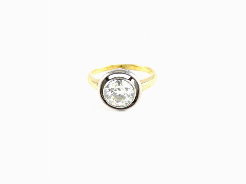 Anello Solitario in Oro Giallo e Bianco con Diamante