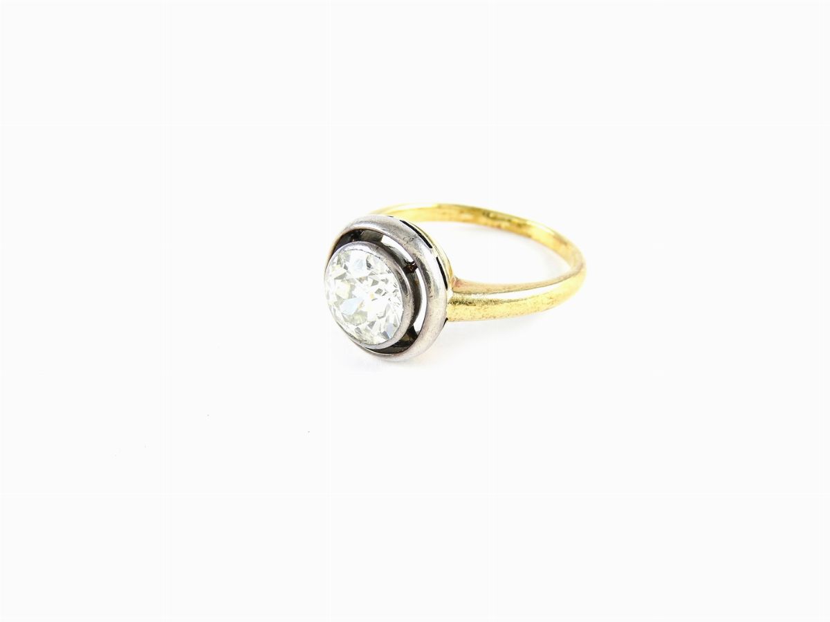 Anello Solitario in Oro Giallo e Bianco con Diamante