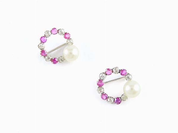 Pair of white gold brooches with diamonds, rubies and Akoya cultured pearls