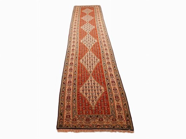 A Persian Senne Long Carpet