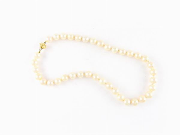 Akoya cultured semi baroque shaped pearls necklace with yellow gold clasp
