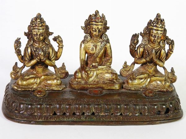 A Partially Gilt Bronze of Three Deities