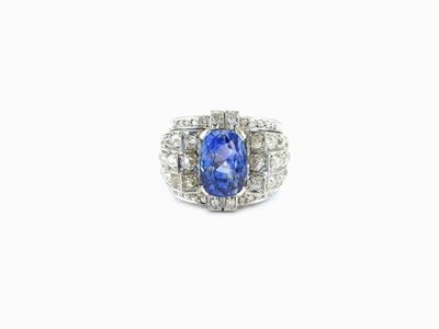 Anello a Fascia in Platino, Diamanti e Zaffiro