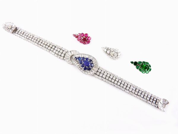 Diamonds studded platinum bracelet with diamonds, rubies, sapphires and emeralds panels