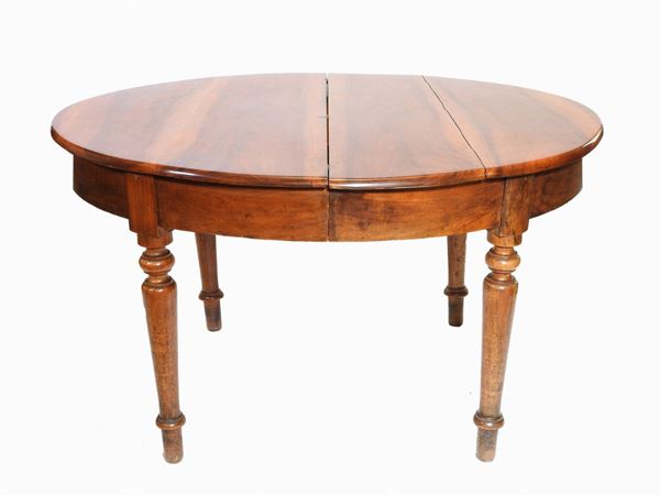 An Oval Cherrywood Table