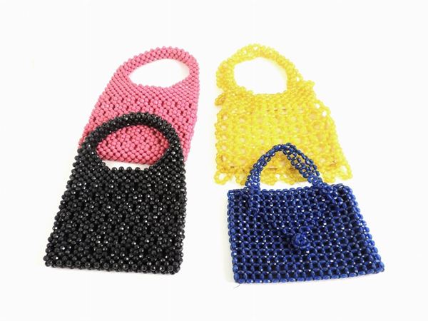 Four Beads hand bags