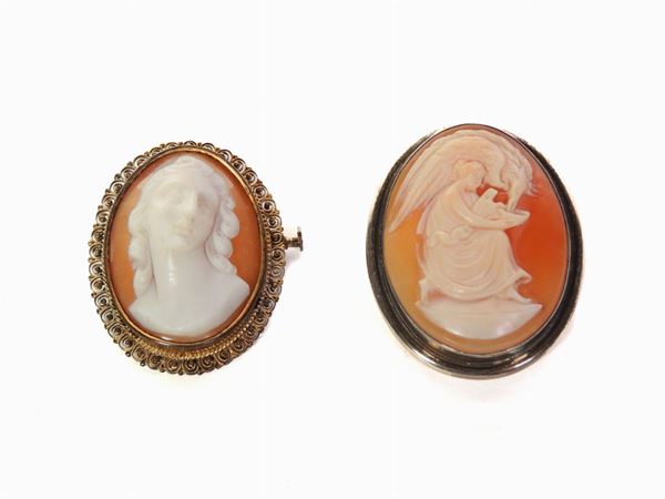 Two pendants with a ladies seashell cameo
