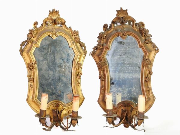 A Set of Five Giltwood Mirrors with Candle Holders