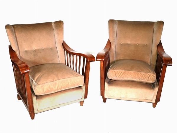 A Pair of Walnut Armchairs