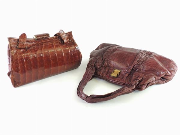 Two brown crocodile and lizard shoulder bags