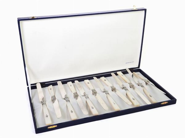 A Set of Twelve Silver and Mother of Pearl Fruit Knives