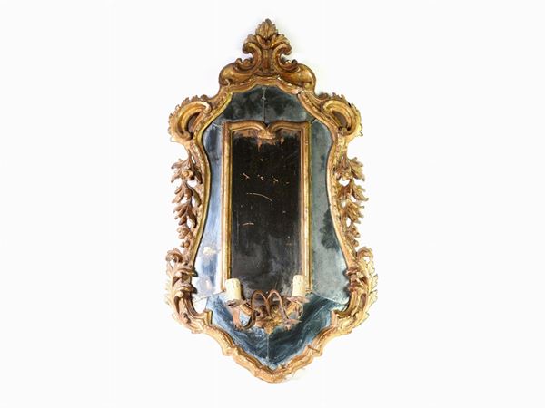 A Giltwood Mirror with Candle Holders