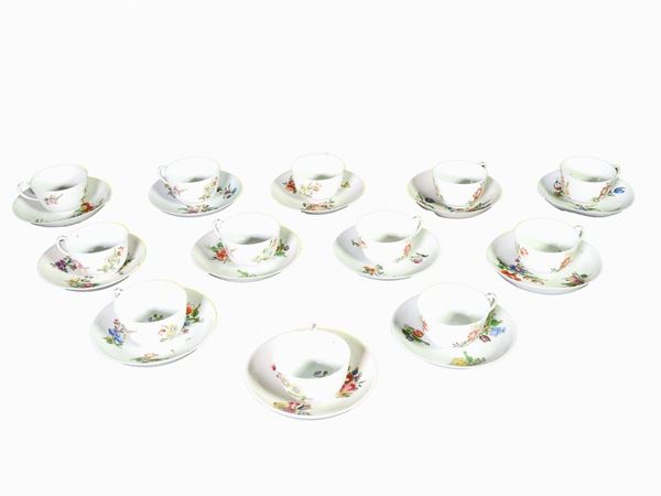 A Set of Twelve Painted Porcelain Coffee Cups