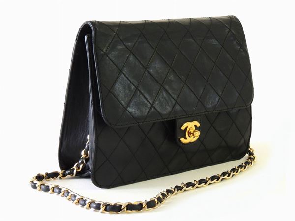At Auction: Chanel Quilted Lambskin Timeless Clutch