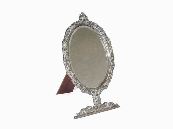A Silver Toilet Mirror