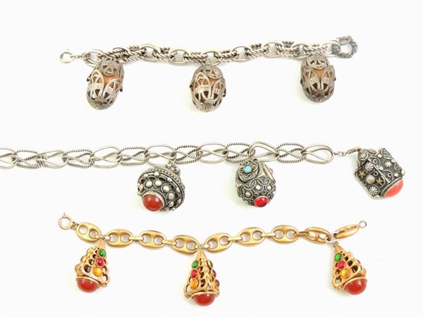 Three metal charms bracelets