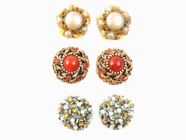 Three goldentone metal, plastic and glass pair of earrings