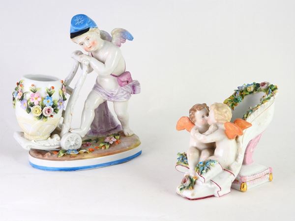Two Polychrome Porcelain Figural Flower Vases