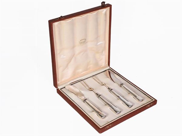 A Set of Four Silver Srving Cutlery