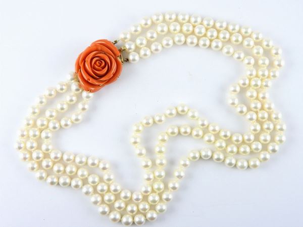 Three strands cultured Akoya pearls necklace with yellow gold and orange red coral clasp