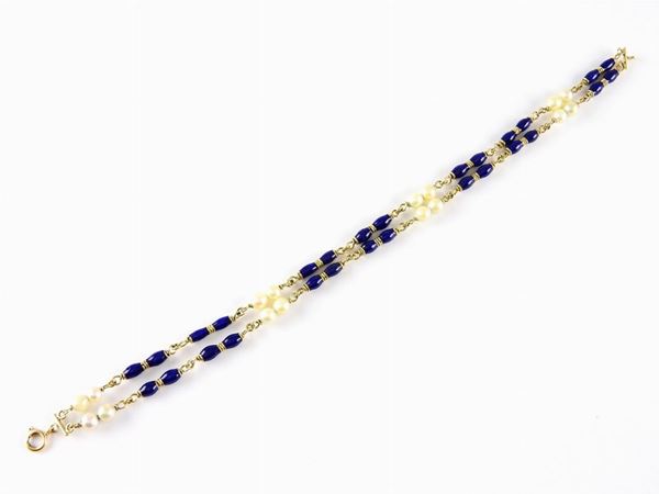 Two strands yellow gold bracelet with blue enamel and Akoya cultured pearls  - Auction Watches and Jewels - I - I - Maison Bibelot - Casa d'Aste Firenze - Milano