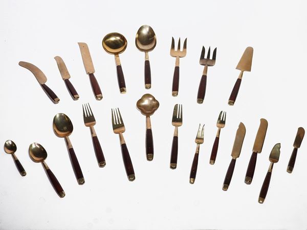 A Gilded Metal and Mahogany Cutlery Set