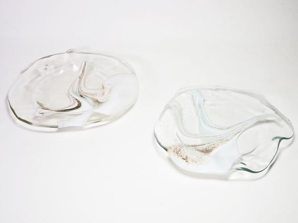 Coppia di piatti in vetro soffiato incolore