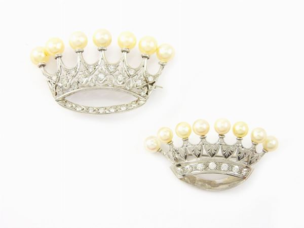 Four white and yellow gold, platinum crown-shaped brooches with diamonds, synthetic rubies, pearls