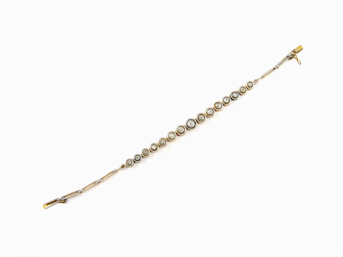 Bracciale Mezzo Tennis Scalare in Oro Bianco e Giallo con Diamanti