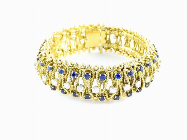 Yellow gold Cartier woven mesh watch bracelet with diamonds and sapphires
