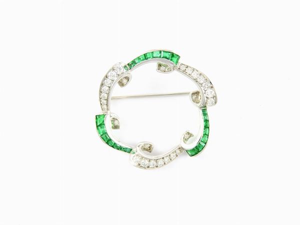 White gold hoop brooch with diamonds and emeralds