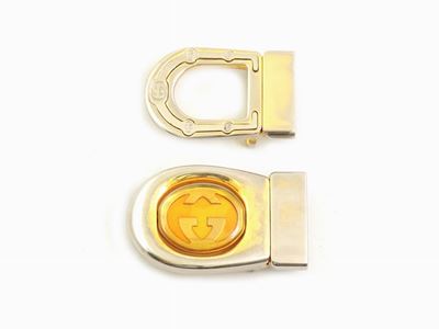 Due Fibbie in Metallo, Gucci