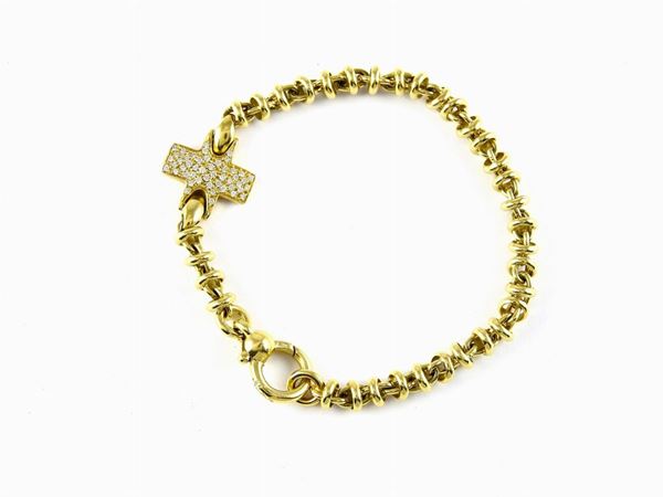 Yellow gold Pomellato bracelet with diamonds